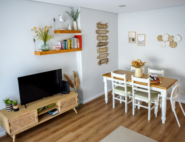 Dining area in the living room next to the television